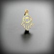 Hamsa evil eye design pendant in gold Online now